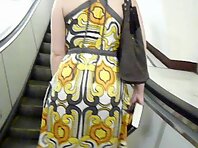 Up1777#Plump blonde in a yellow dress. Big round ass in red shorts. Woman do not feel a. Rea