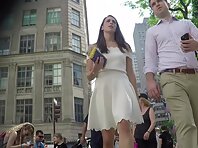 Up4220#A girl in a wide white skirt is upskirted. Our cameraman caught a close-up of her rou