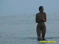 Nu1027#Naked girl leaves the sea after a swimming