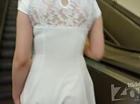 Up2723#Under the skirt of a fat girl in a short white dress. Our cameraman took a close-up s