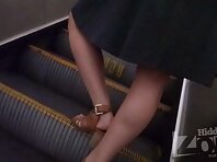 Up4243 #Upskirting a tanned girl in a wide gray skirt. Our cameraman repeatedly slipped his h