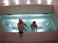 Pv36137#Hiddencam in the swimming pool. A hidden camera caught a completely naked tanned coup