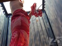 Bc1761#Tanned blonde in a long red dress. She took off her dress with panties and pussy turn