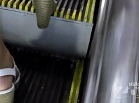 Up2406#Upskirt brunette in a short red skirt. Beautiful round ass and shaved crotch in red p